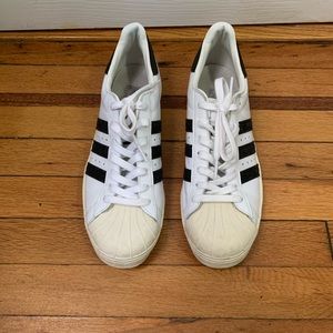 White and black adidas with cream soles